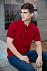 Рубашка поло мужская Sunset, красная с логотипом в Волгограде заказать по выгодной цене в кибермаркете AvroraStore